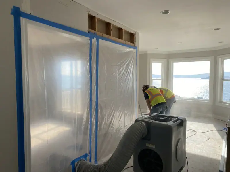 Plastic containment with a negative air machine and flood-cut drywall in Belvedere Tiburon, California
