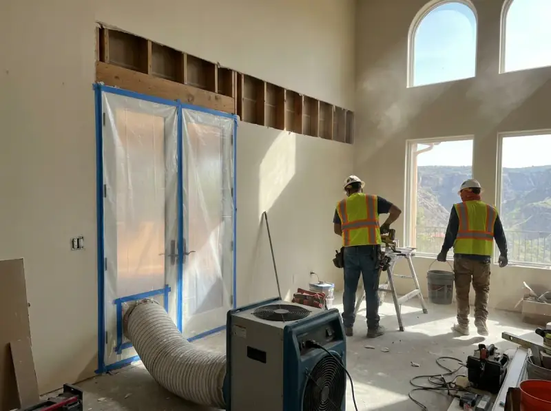 Plastic containment with a negative air machine and flood-cut drywall in Calabasas, California