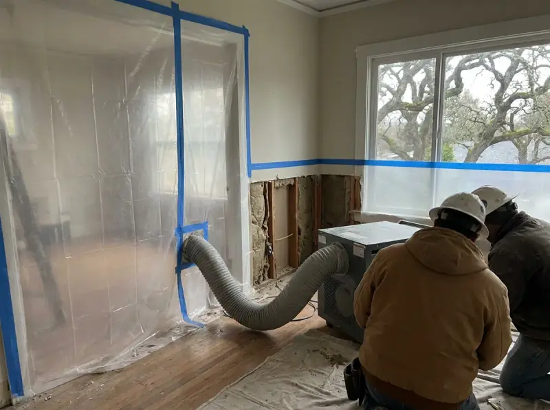 Plastic containment with a negative air machine and flood-cut drywall in Santa Rosa, California